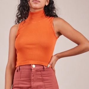 Sleeveless essential turtleneck burnt orange big bud press